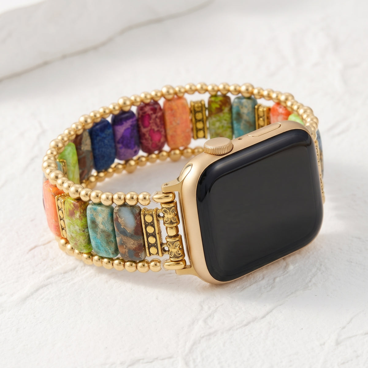 Chakra Noir rainbow sea sediment jasper stretch Apple Watch strap with gold watch